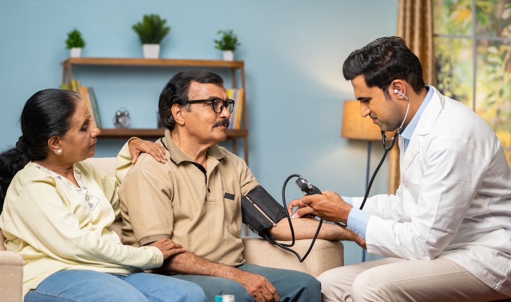 Doctor consulting a patient at NXTUS Critical Care Clinic in Ahmedabad, offering critical care services, diabetes, thyroid, and gastrointestinal care.